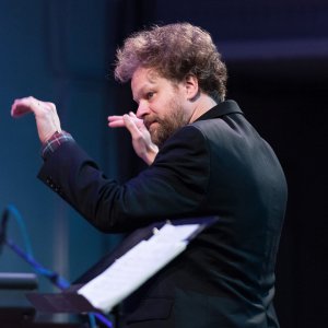 Matthew Welch conducting