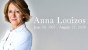 Alt Text: ``` Scenic designer Anna Louizos in a white shirt, with her name and the dates June 24, 1957 – August 25, 2026